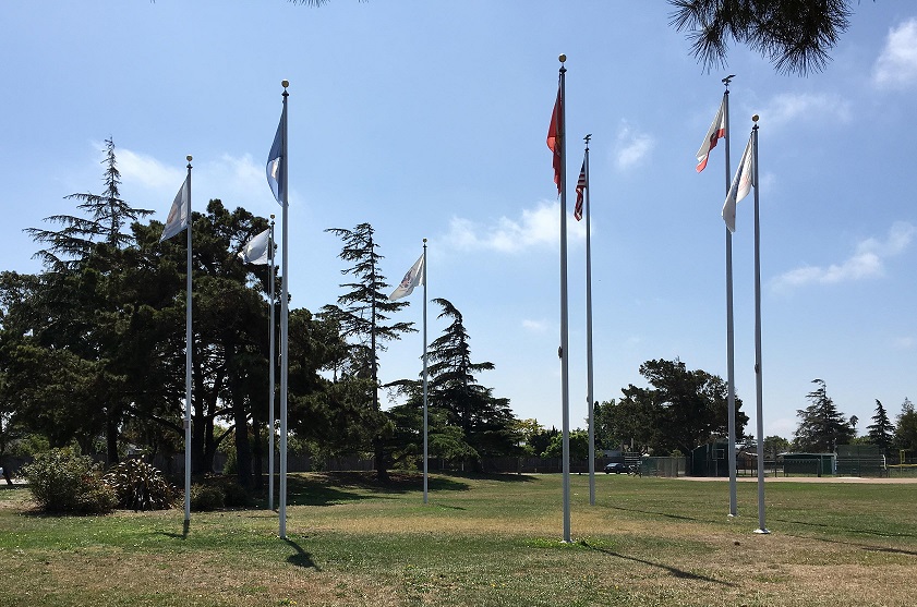 photo of flag poles as part of memorial