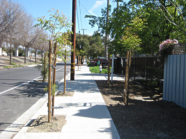 Finished sidewalk in Cherryland. Photo links to photo album that open in a new window.